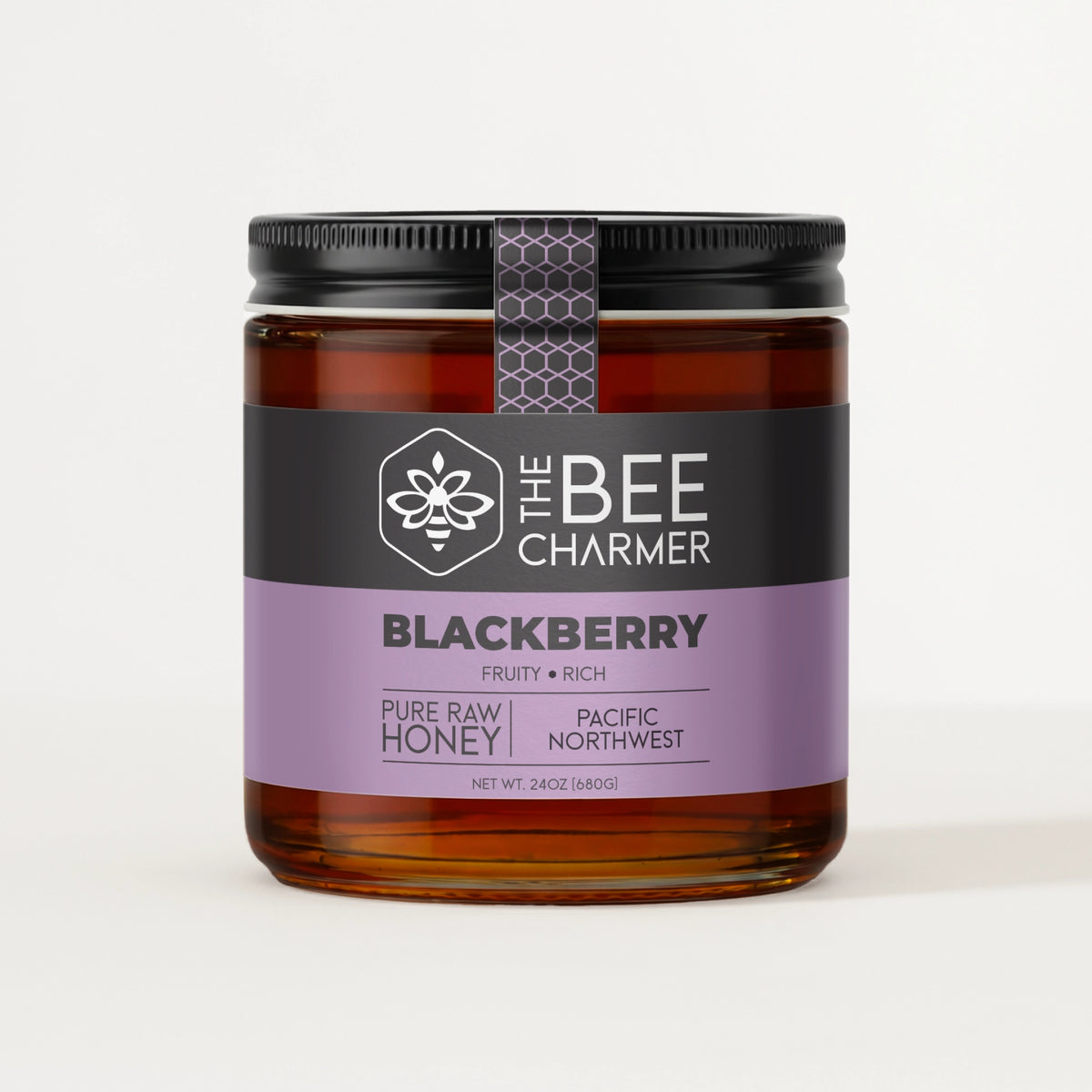 Pure raw Blackberry honey in a signature Bee Charmer branded 24oz wide-mouth glass jar.  This is our largest available size.