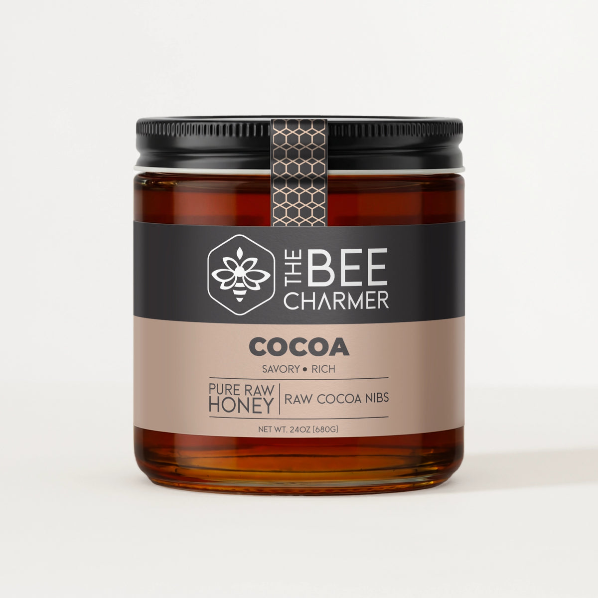 Cocoa Honey in a signature Bee Charmer branded 24oz wide-mouth glass jar.  This is our largest available size.