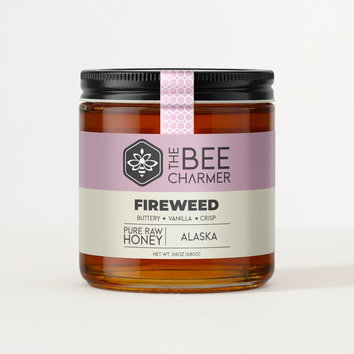 Pure raw Fireweed honey in a signature Bee Charmer branded 24oz wide-mouth glass jar.  This is our largest available size.