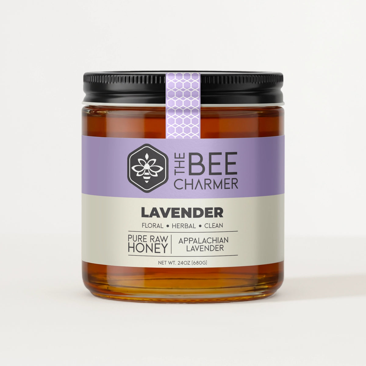 Lavender Honey in a signature Bee Charmer branded 24oz wide-mouth glass jar.  This is our largest available size.