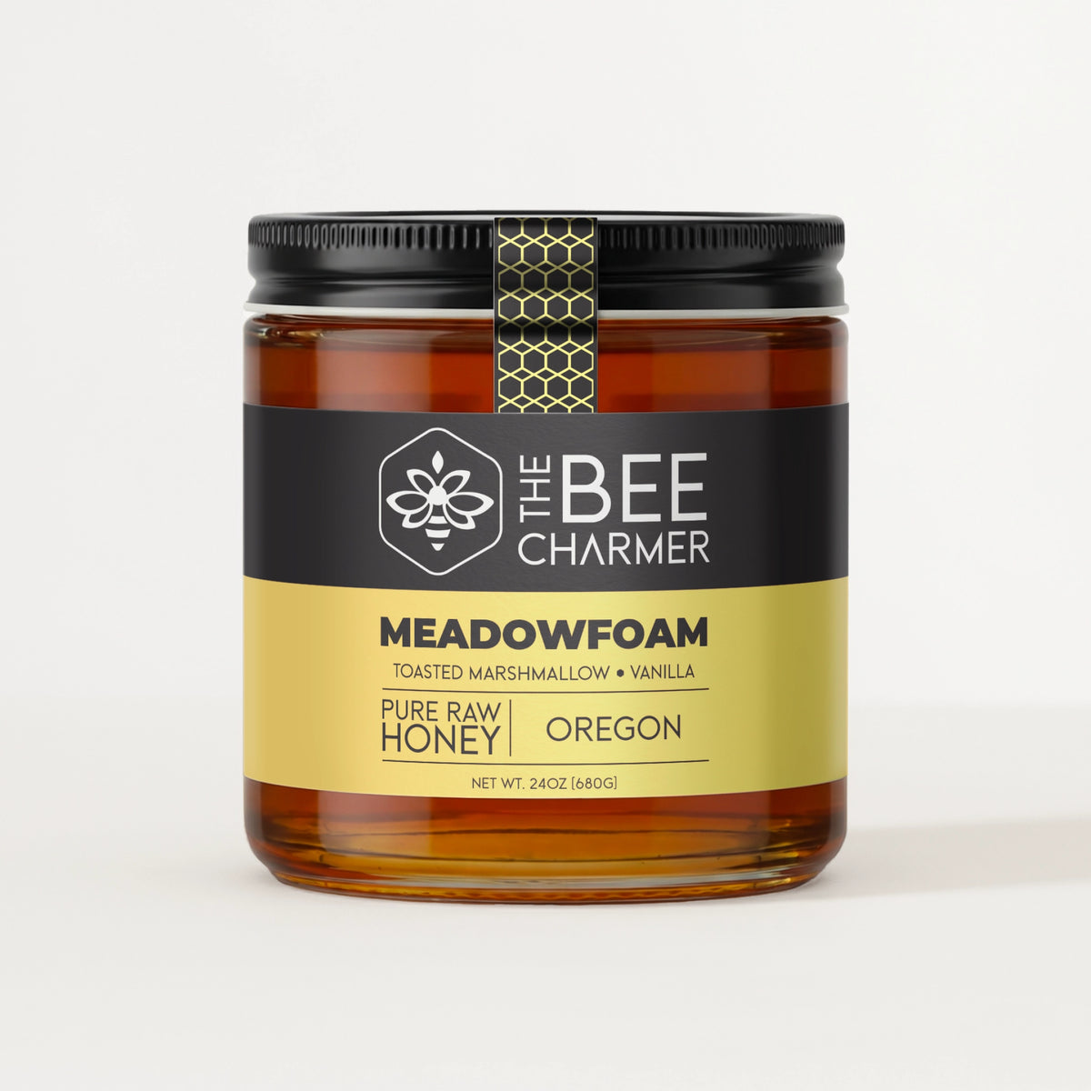 Pure raw Meadowfoam Honey in a signature Bee Charmer branded 24oz wide-mouth glass jar.  This is our largest available size.