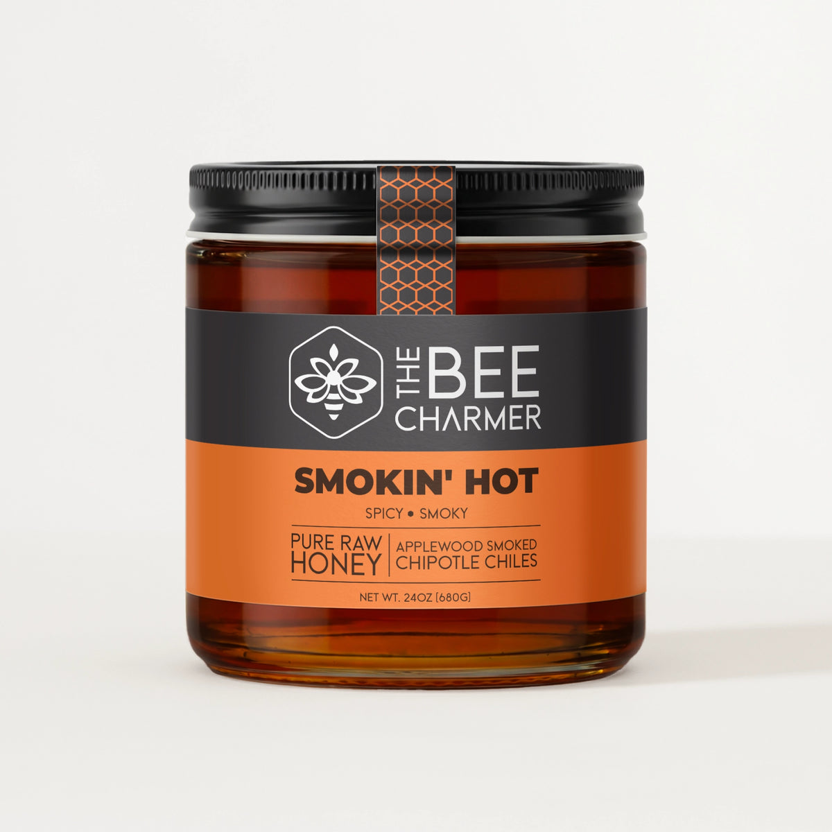 Applewood-smoked chipotle chile-infused Smokin Hot Honey in a signature Bee Charmer branded 24oz wide-mouth glass jar.  This is our largest available size.