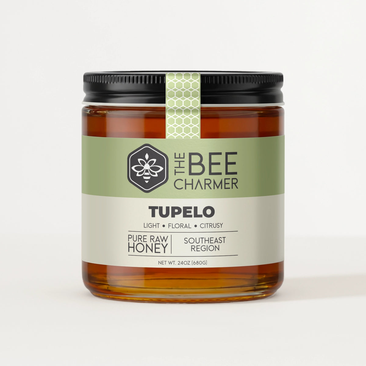 Pure raw Tupelo Honey in a signature Bee Charmer branded 24oz wide-mouth glass jar.  This is our largest available size.