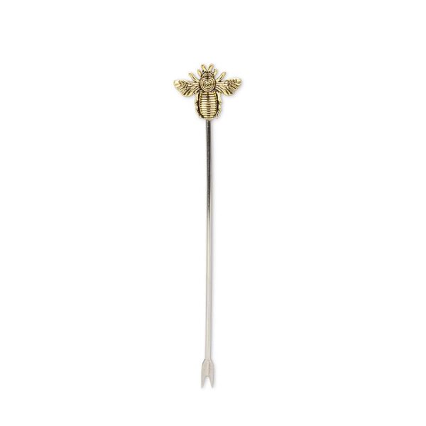 A stainless-steel cocktail pick with a decorative bee handle from The Bee Charmer.